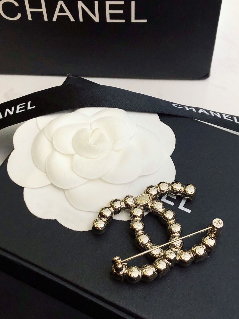 Ch**el brooches